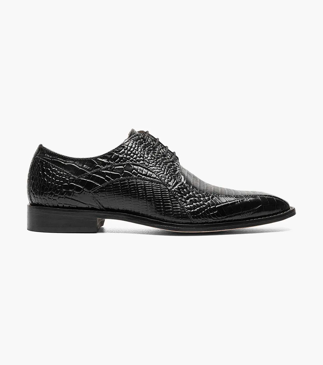 Stacy Adams Turano Bike Toe Oxford in black features a croco print leather upper with a crocodile pattern, lace-up closure, and low heel, shown against a plain white background.