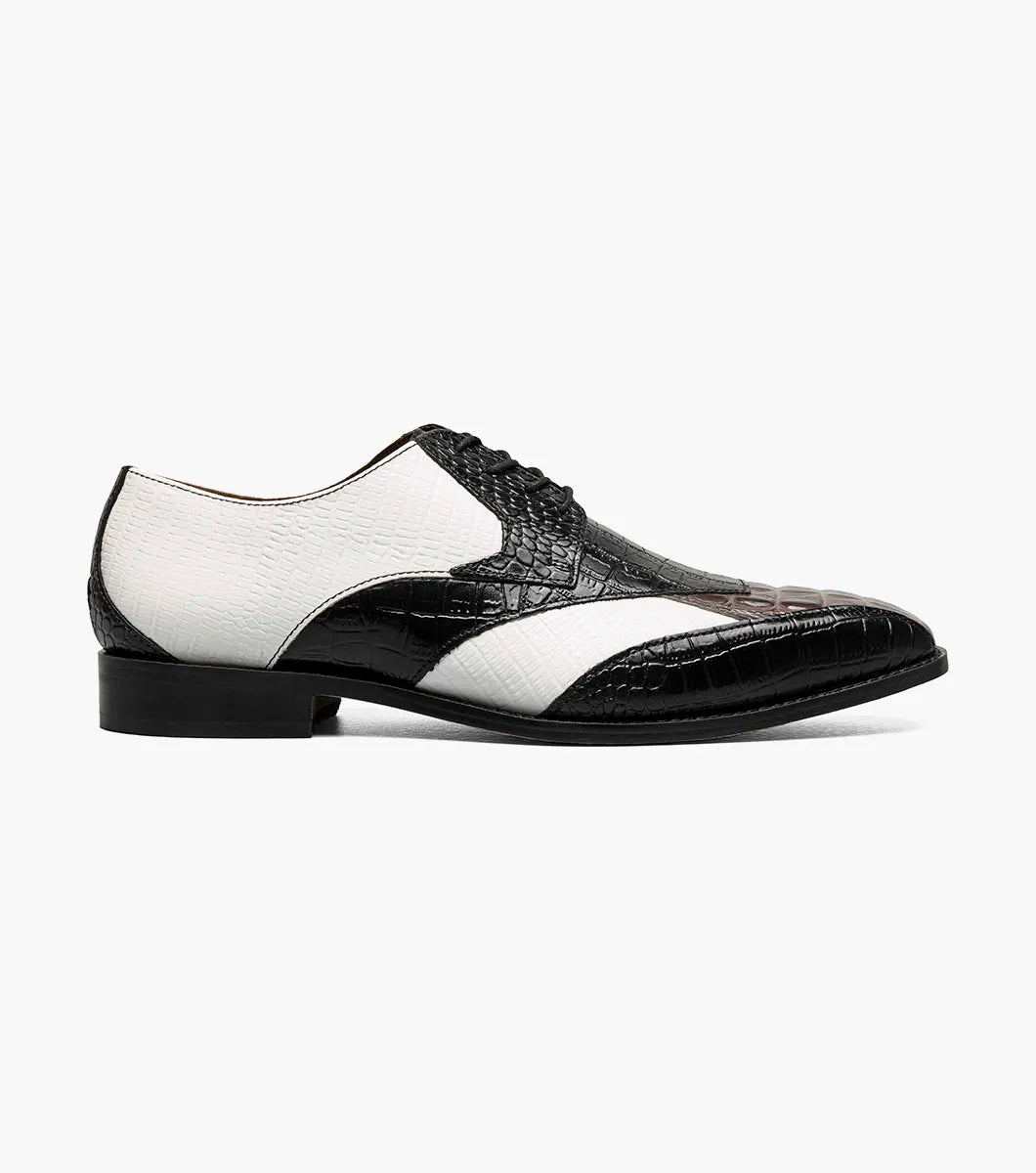 The STACY ADAMS Tristano Modified Bike Toe Oxford in Black/Grey (style 25694-910) is a men's lace-up dress shoe featuring bold crocodile and lizard print leather panels for a striking textured look.