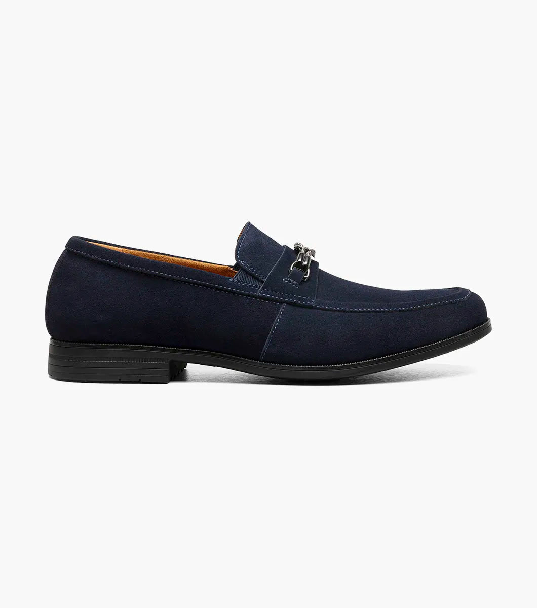 The STACY ADAMS Ravelle Moc Toe Bit Slip On in Navy Suede has an insole with a molded heel cup, anatomical arch support, and a cushioned footbed with a cushioned heel pod for ergonomic comfort.