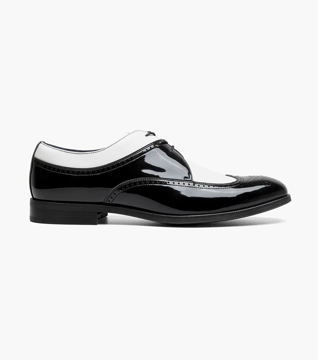 The Stacy Adams Dayton II Wingtip Oxford (Black w/ White, 25720-111) features a glossy finish, classic wingtip design, low heel, and cushioned footbed for comfort—a stylish men’s dress shoe from STACY ADAMS.