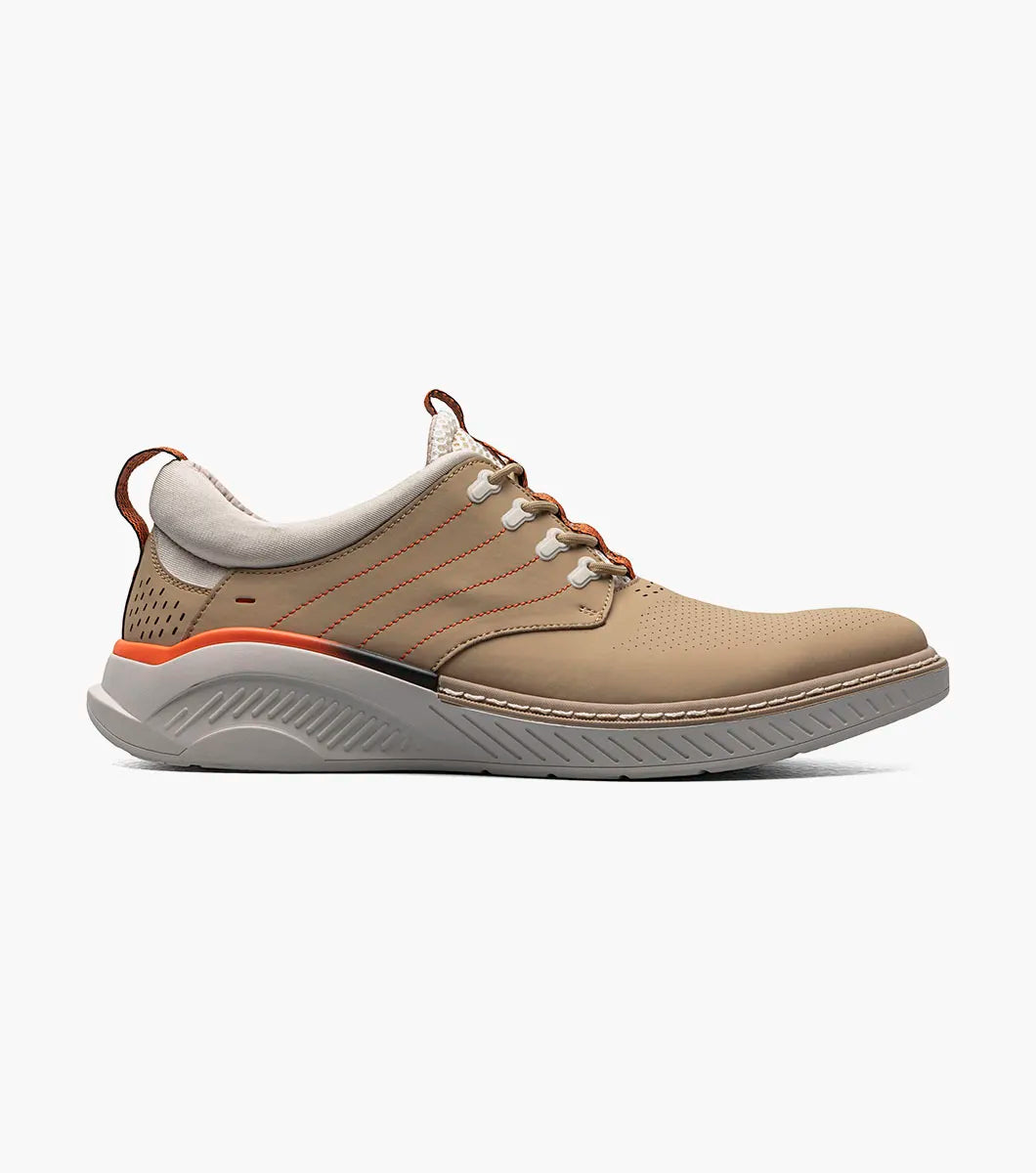 The Stacy Adams Barna Plain Toe Lace Up in khaki features a leather upper, orange accents, perforated toe, textured sole, patterned laces, and padded collar, shown on a white background.