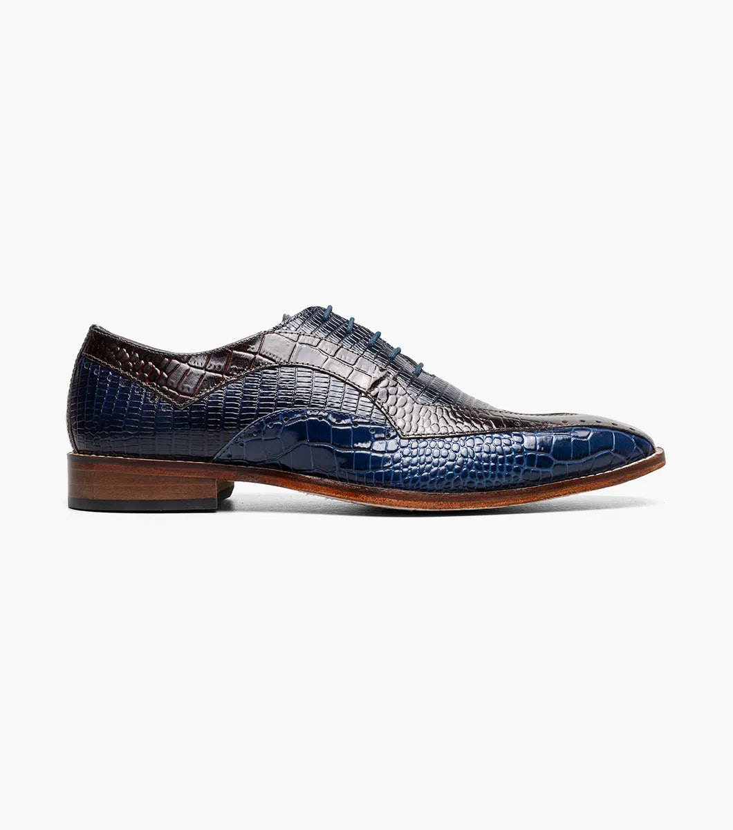 The Stacy Adams Tallero V-Tip Oxford (Dark Blue Multi, 25682-469) features a shoe insole with a molded heel cup, anatomical arch support, and cushioned heel pod to enhance comfort and highlight its supportive design.