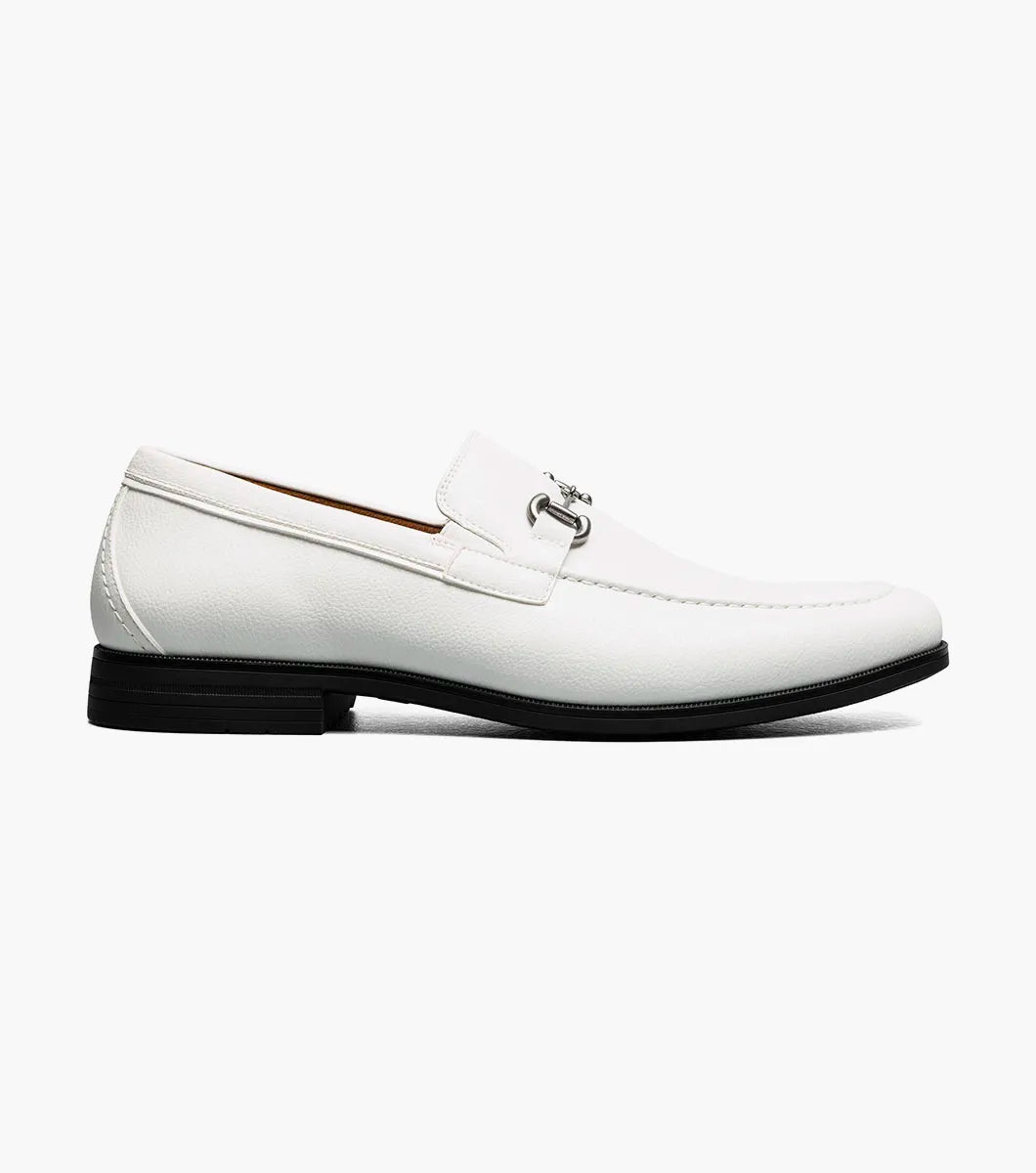 Step up your style with the STACY ADAMS Richmont Moc Toe Bit Slip On in White Tumbled (21567-117), featuring a sleek silver bit, black sole, and tan lining—classic leather loafers perfect for any dress occasion. Displayed on a white background.