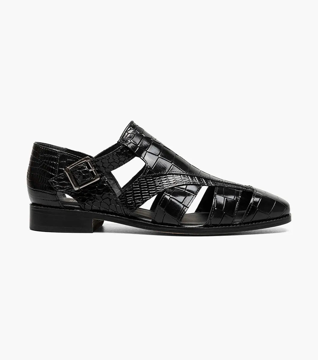 The STACY ADAMS Calandro City Sandal (25695-001) in black features sustainable microfiber with a crocodile texture, side cutouts, closed toe, low heel, and a metal buckle strap.
