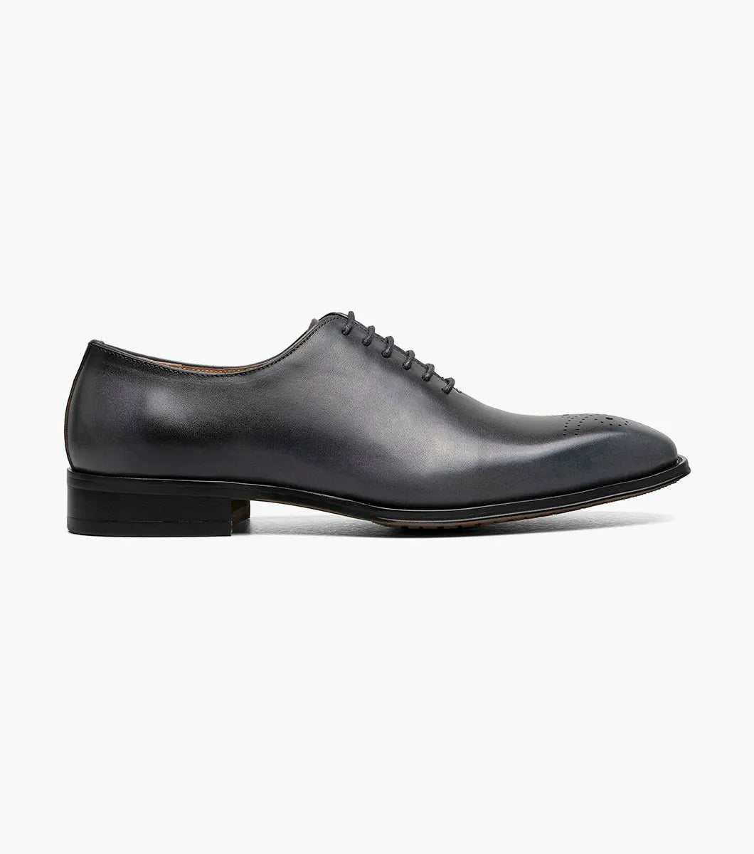 A single Stacy Adams Hallquist Plain Toe Oxford in gray, featuring closed lacing, subtle perforated toe detail, and a Memory Foam insole, displayed on a white background.