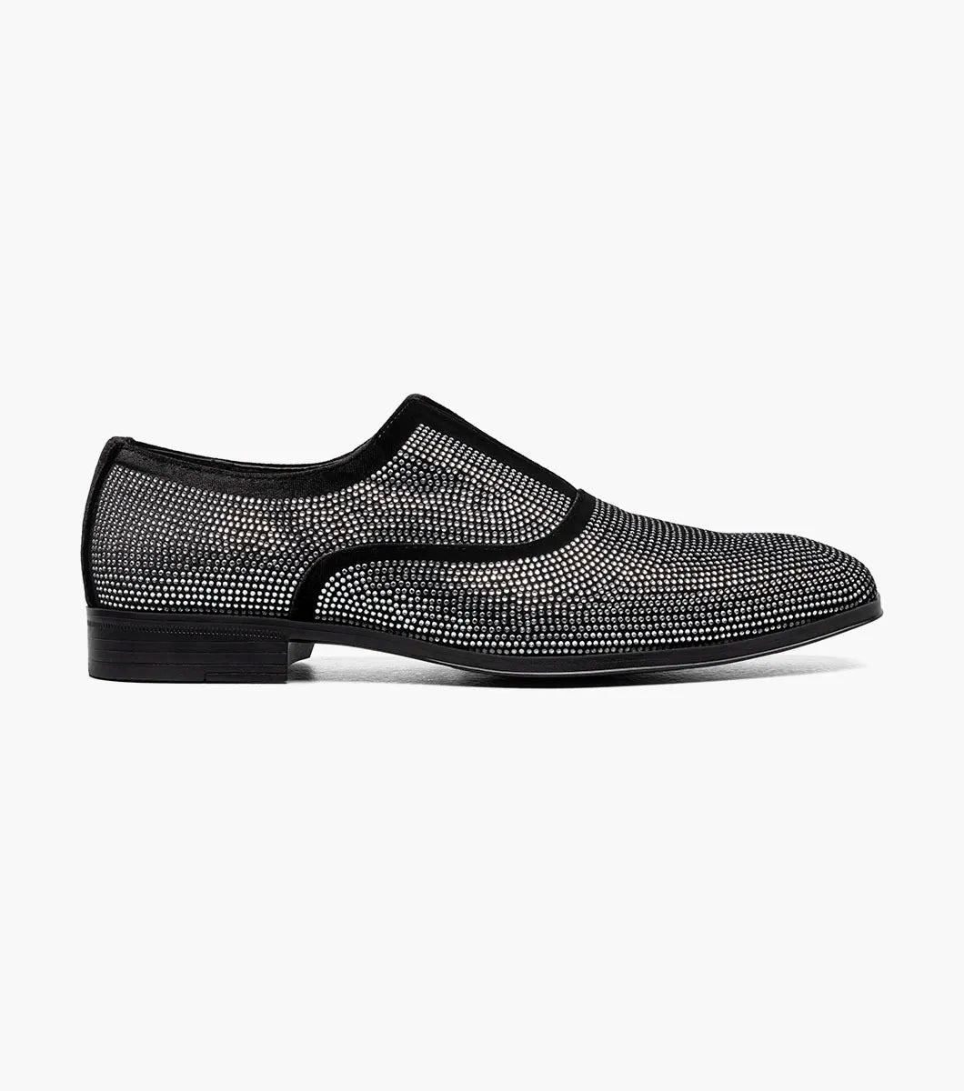 The STACY ADAMS Starleigh Rhinestone Plain Toe Slip On in black and silver (25685-042) features a velour textile upper, textured metallic silver mesh pattern, and low black heel, shown on a plain white background.