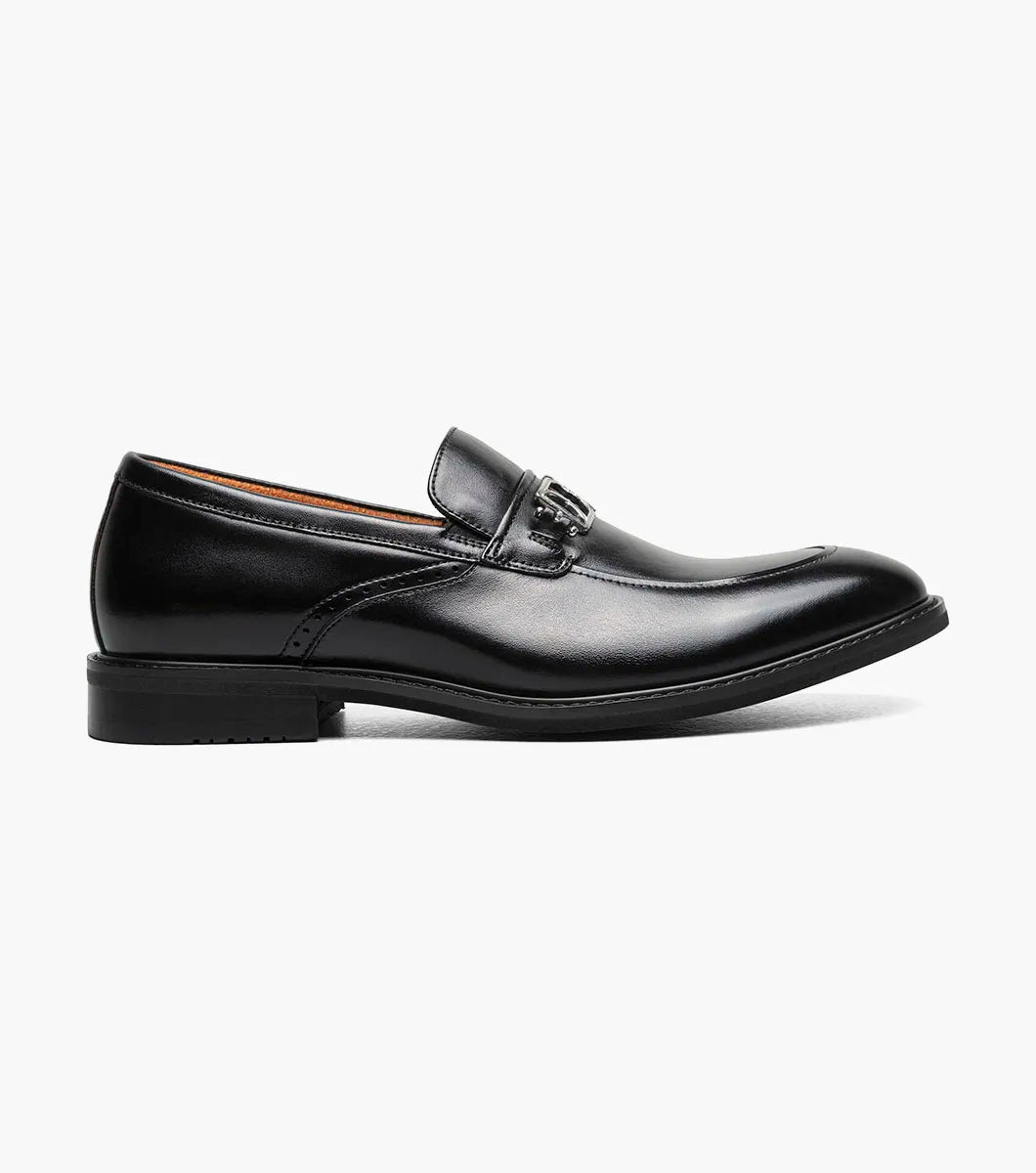 The Stacy Adams Boyd Moc Toe Bit Slip On (Black, 25753-001) features a black leather loafer design with a metal bit detail, low heel, moc toe, visible stitching, and a cushioned footbed for comfort.