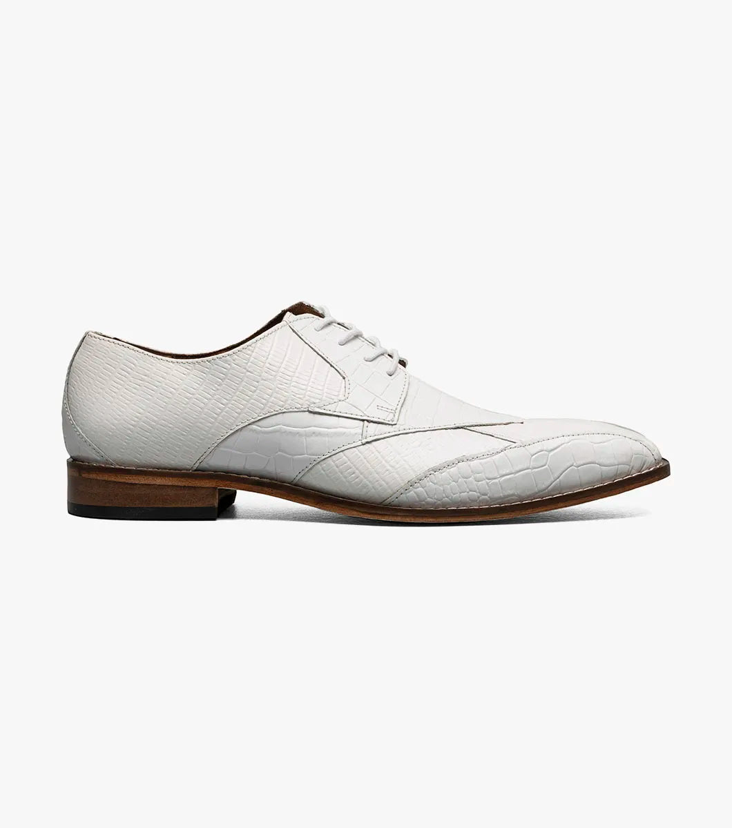 The Stacy Adams Tristano Modified Bike Toe Oxford in white features crocodile print leather, a genuine leather outsole, brown sole, and lace-up closure, displayed on a white background.