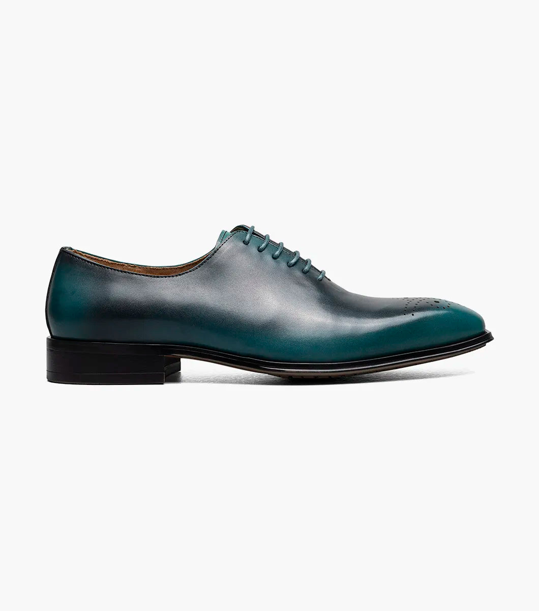 The Stacy Adams Hallquist Plain Toe Oxford in turquoise, featuring smooth leather, closed lacing, black sole, Memory Foam insole, and toe perforations, is shown on a white background.