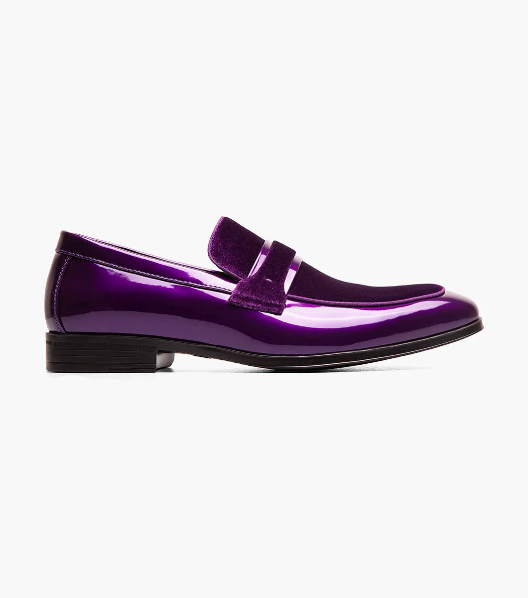 A single STACY ADAMS Spratley Moc Toe Saddle Slip On in purple (style 25686-542) is displayed against a plain white background, showcasing its shiny velour upper, low black heel, and comfortable memory foam insole.