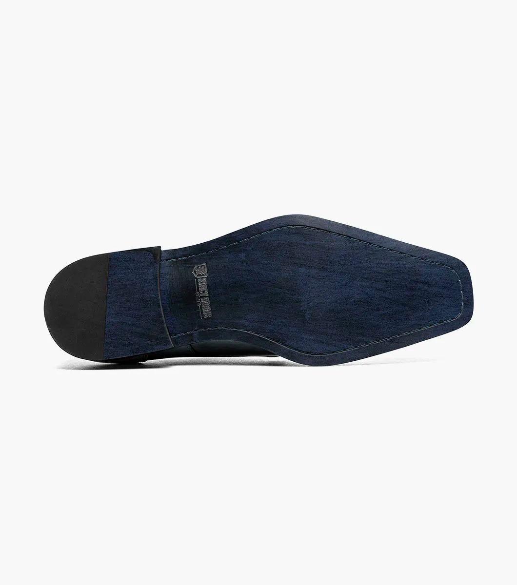 The STACY ADAMS Palmento Modified Cap Toe Oxford (Gray Multi, 25740-062) features decorative perforations, laces, a leather upper, and low heel, shown as a single dress shoe on a white background.