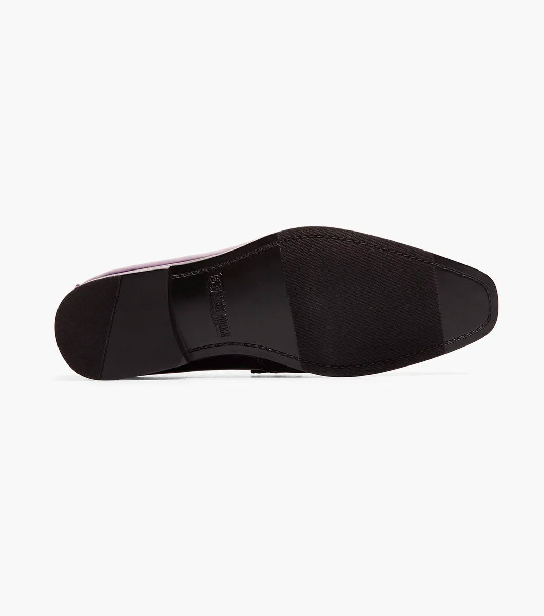 A single STACY ADAMS Spratley Moc Toe Saddle Slip On in purple (style 25686-542) is displayed against a plain white background, showcasing its shiny velour upper, low black heel, and comfortable memory foam insole.