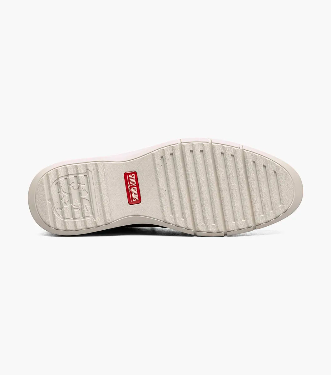 The Stacy Adams Score Plain Toe Elastic Lace Up in black features a leather upper with light gray rubber sole, white stitching, and perforated detailing on the side. Seen from a slight angle, this STACY ADAMS shoe blends refined business-casual style with everyday comfort.