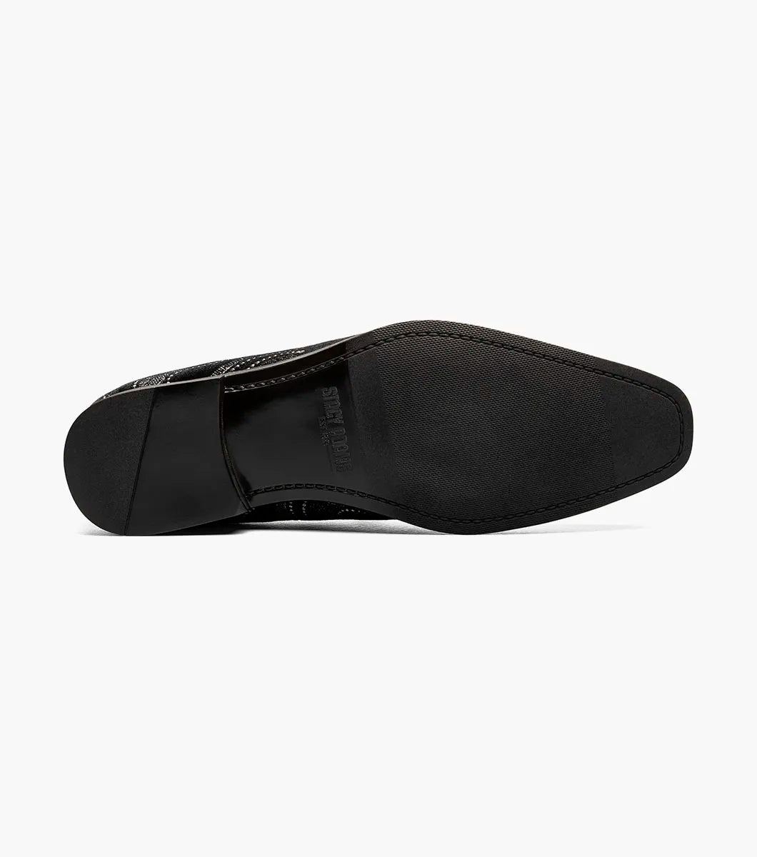 The Stacy Adams Swainson Plain Toe Embroidered Slip On (Black and Silver, 25669-042) features black suede, swirling silver and black embroidery, a low heel, and a memory foam insole for effortless style and comfort.