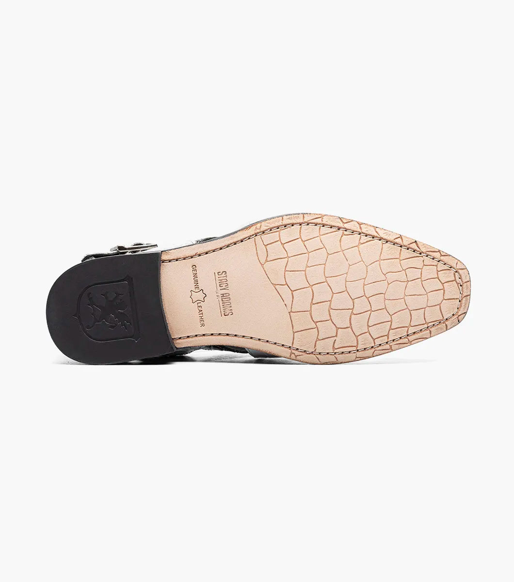 The Stacy Adams Calandro City Sandal (25695-111) features a black and white closed-toe design with cut-out sections, buckle strap, low heel, textured crocodile print leather, and a genuine leather sole.