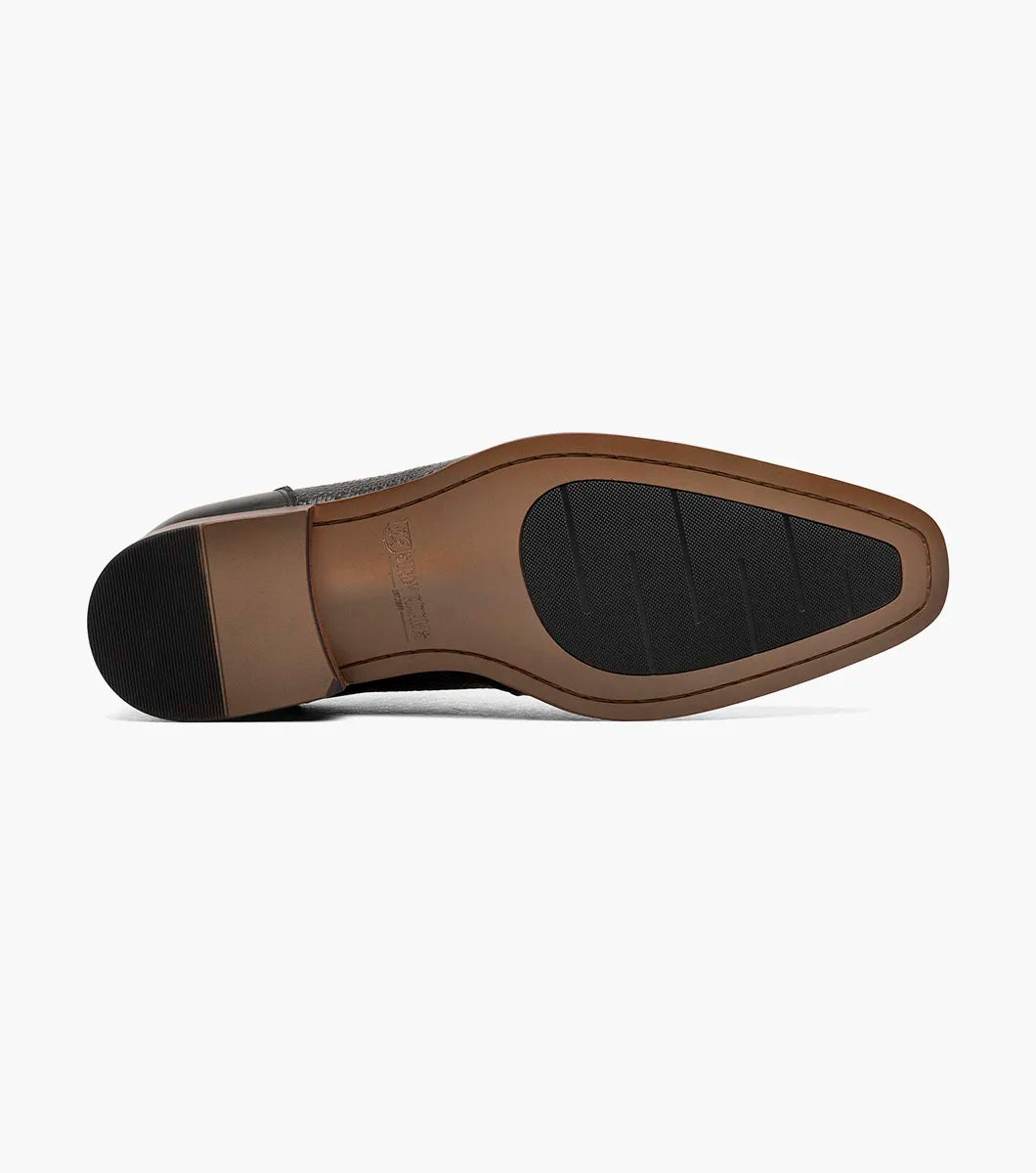 The Stacy Adams Silsbury Cap Toe Oxford in black features a leather upper with textured pattern, wooden heel, elegant perforated detailing, and a Memory Foam footbed for comfort. Style code: 25675-001.