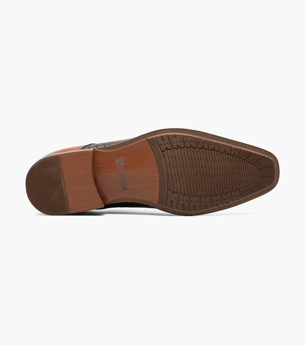The Stacy Adams Halloway Plain Toe Oxford in Brown Multi features perforated detailing, closed lacing, a low wooden heel, and a cushioned Memory Foam insole. Shown on a plain white background.