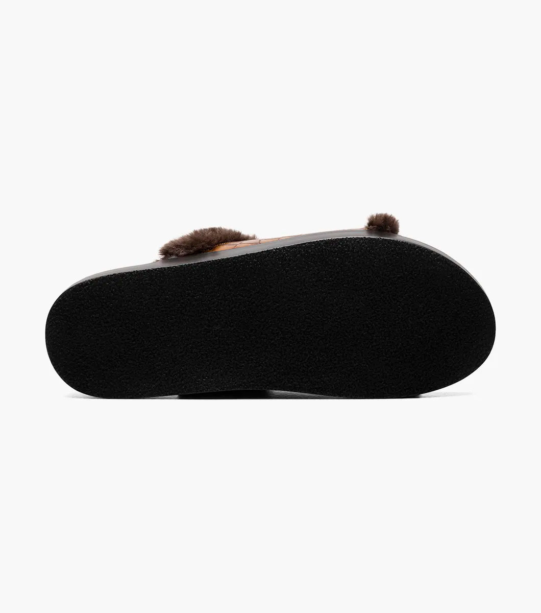 The STACY ADAMS Monty Slide Sandal in Cognac features a brown crocodile print leather strap, dark brown faux fur trim, and black sole, shown on a white background. Style number: 25560-221.