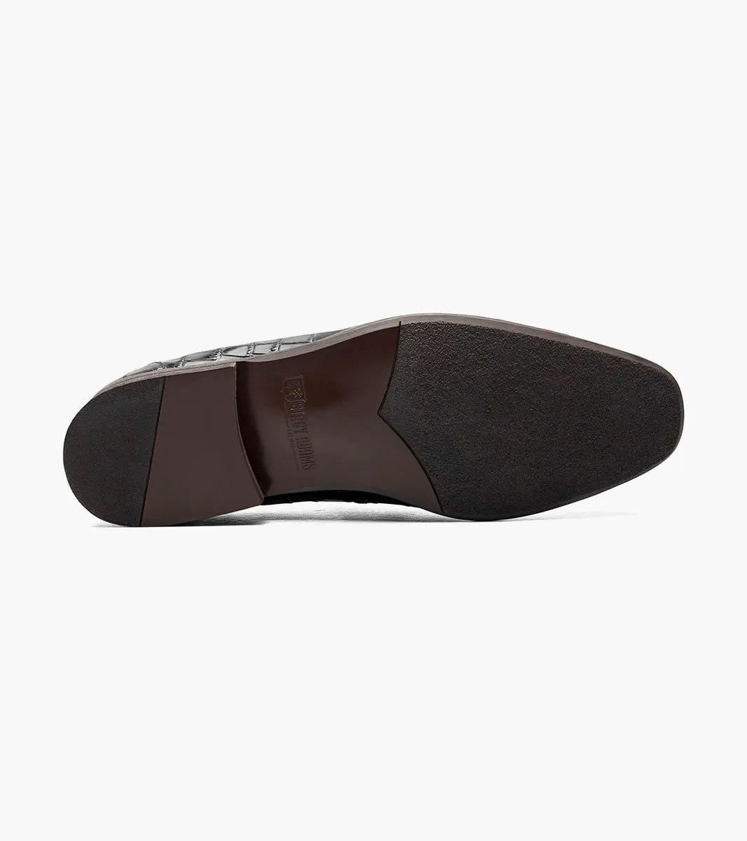 STACY ADAMS Franz Moc Toe Tassel Slip On loafer in black crocodile print leather features a slip-on design with tassel detail, a RedZone footbed for enhanced comfort, and a low brown heel. Shown on a plain white background.