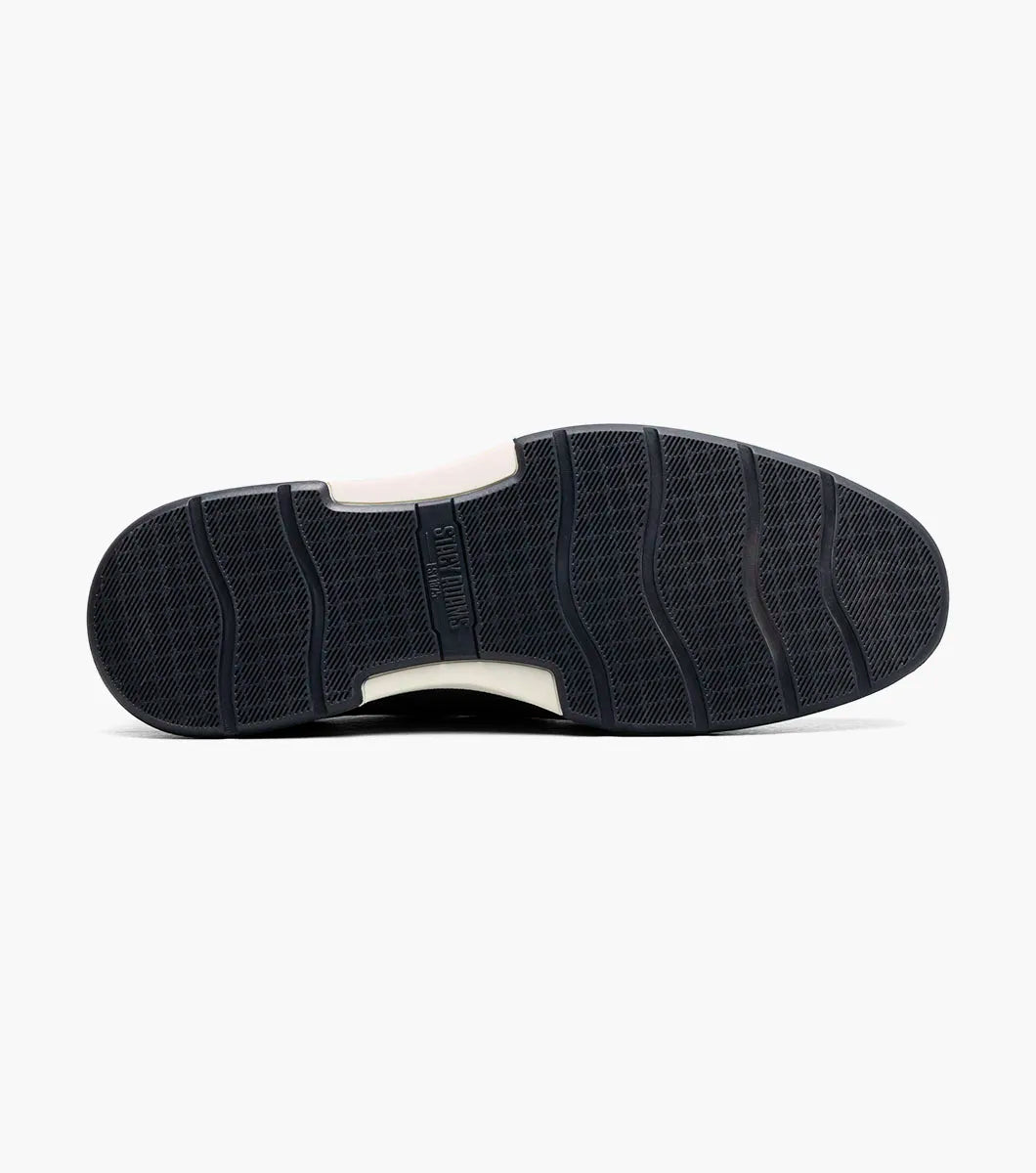 The Stacy Adams Phineas Plain Toe Oxford in navy features tan heel and sole accents, a textured upper, lace-up closure, and cushioned insole for comfort.