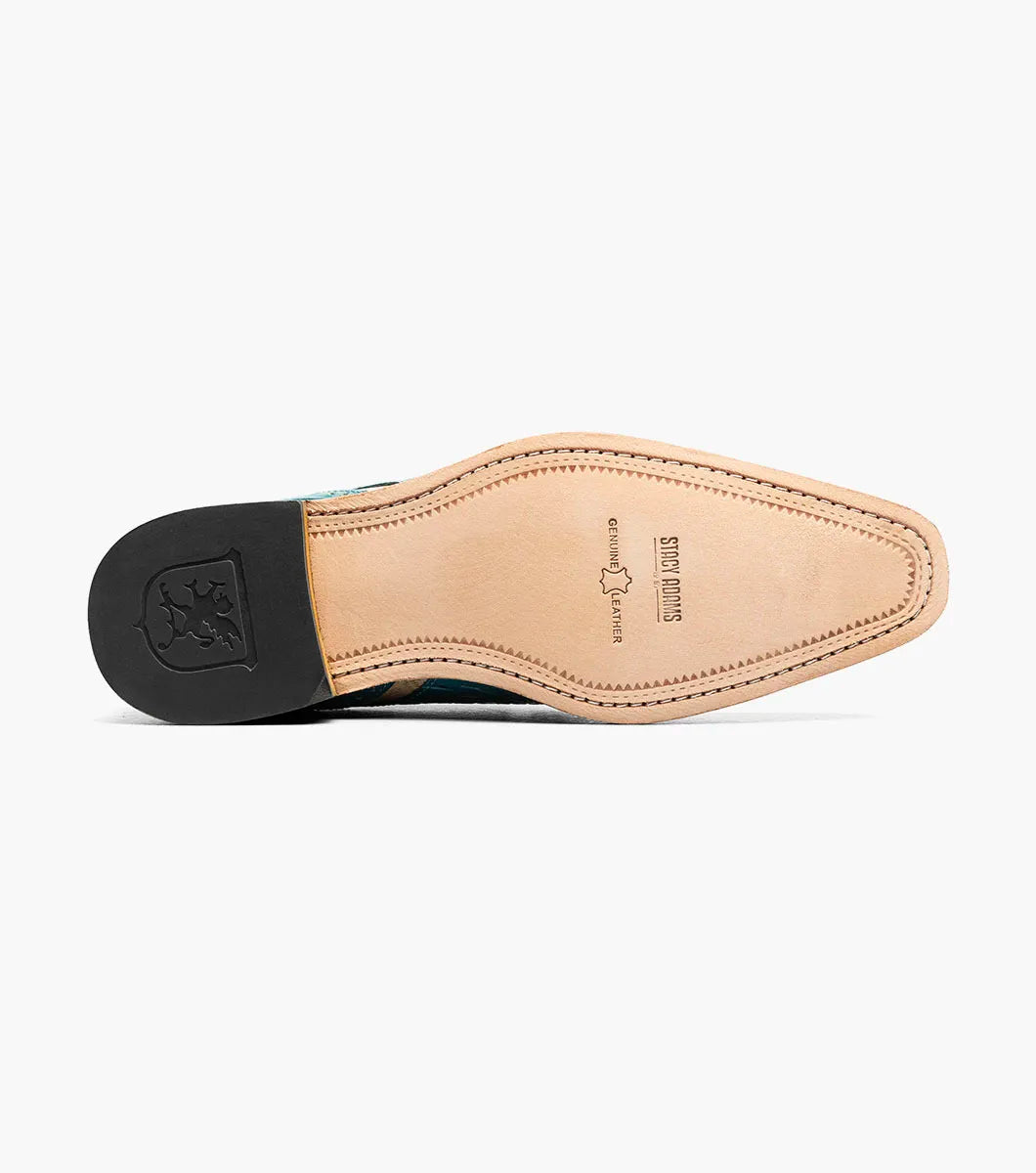 The Stacy Adams Talamanco Bike Toe Oxford in Teal Multi (Style 25788-448) features a sophisticated blend of teal blue and beige crocodile-textured leather, detailed with classic broguing and set atop a brown sole—combining timeless elegance with everyday comfort for any occasion.