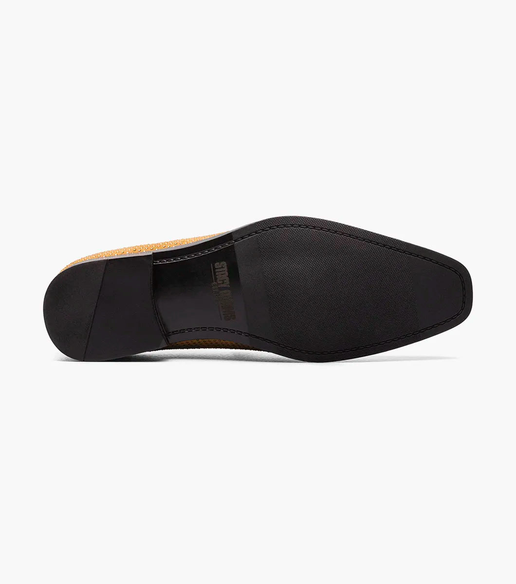 STACY ADAMS Suave Rhinestone Slip On in Tan (25583-240) is a suede dress shoe loafer with perforated detail, black sole, low heel, and cushioned memory foam footbed, shown on a white background.