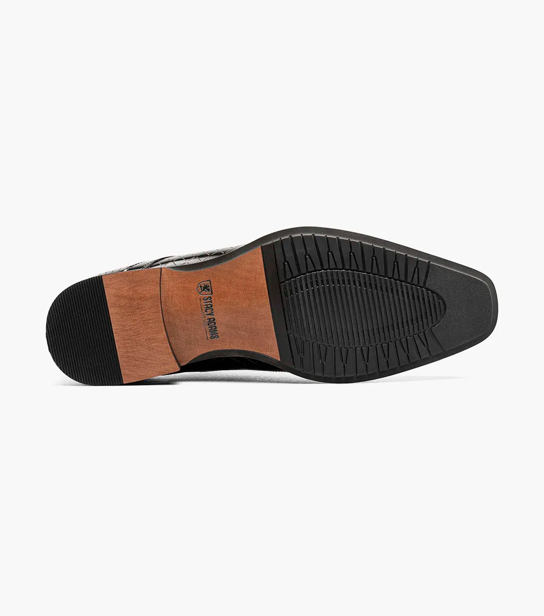 The Stacy Adams Hobson Cap Toe Oxford (25764-001) is a single black dress shoe with shiny, laser-etched geometric leather and black laces, displayed on a plain white background.