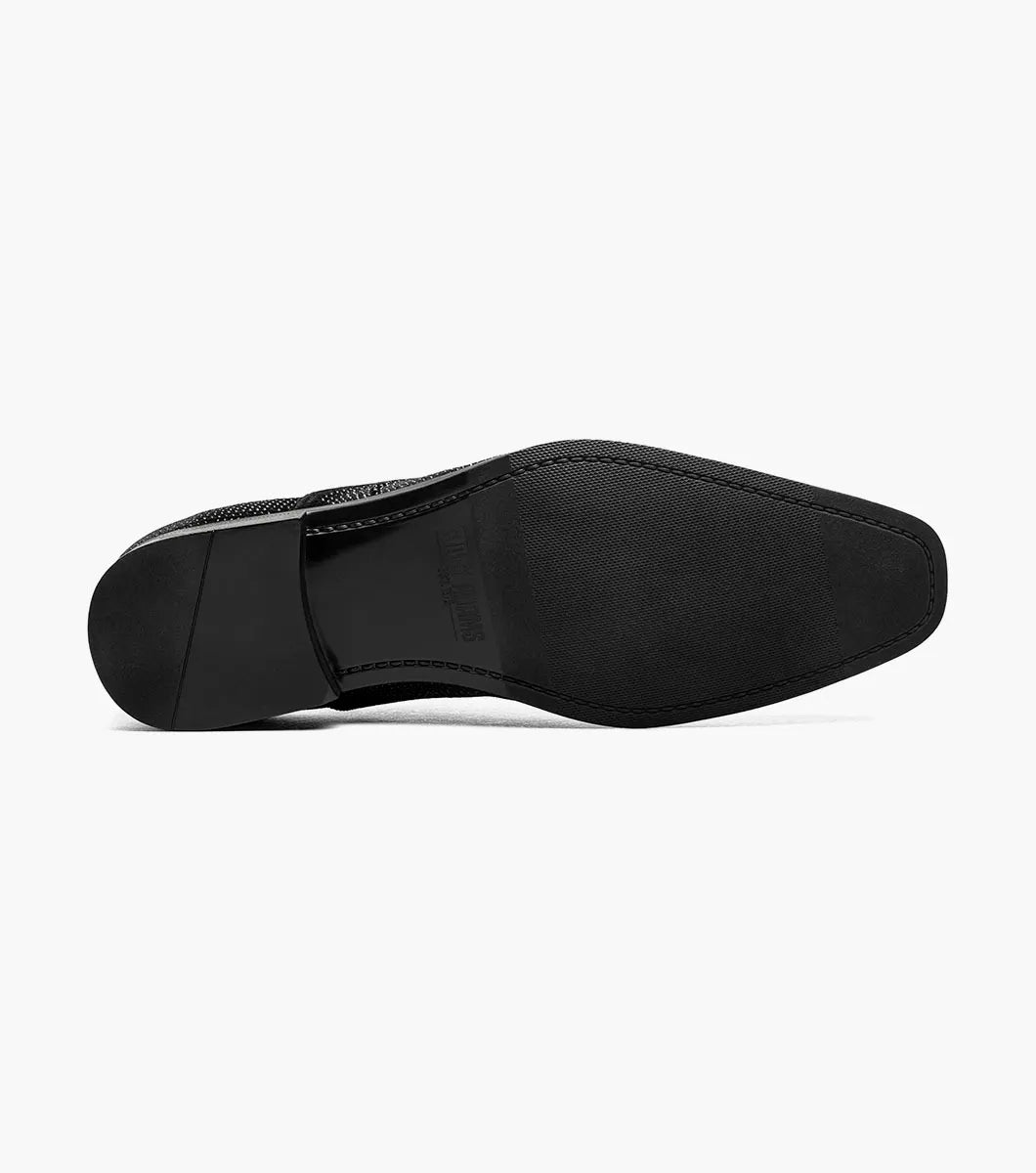 The Stacy Adams Starleigh Rhinestone Plain Toe Slip On (Black, 25685-001) is a men's black slip-on dress shoe with a low heel, rounded toe, cushioned footbed, and small silver rhinestones across the upper.