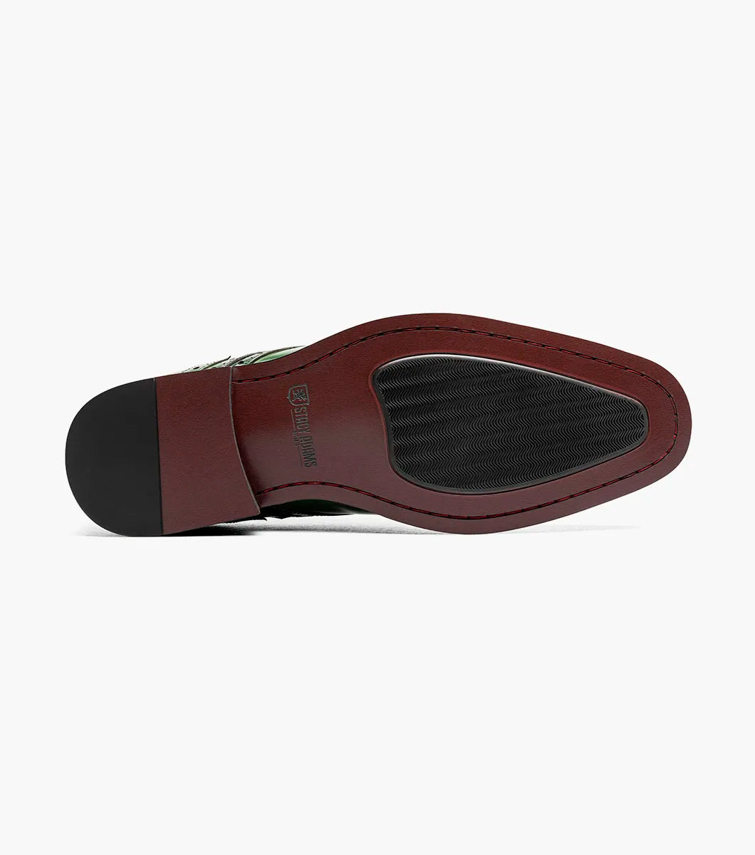 The Stacy Adams Alexander Plain Toe Oxford (25791-300) in polished green calf leather features decorative stitching and perforations, classic laces, a low black heel, and a comfortable Memory Foam insole—all showcased against a plain white background.