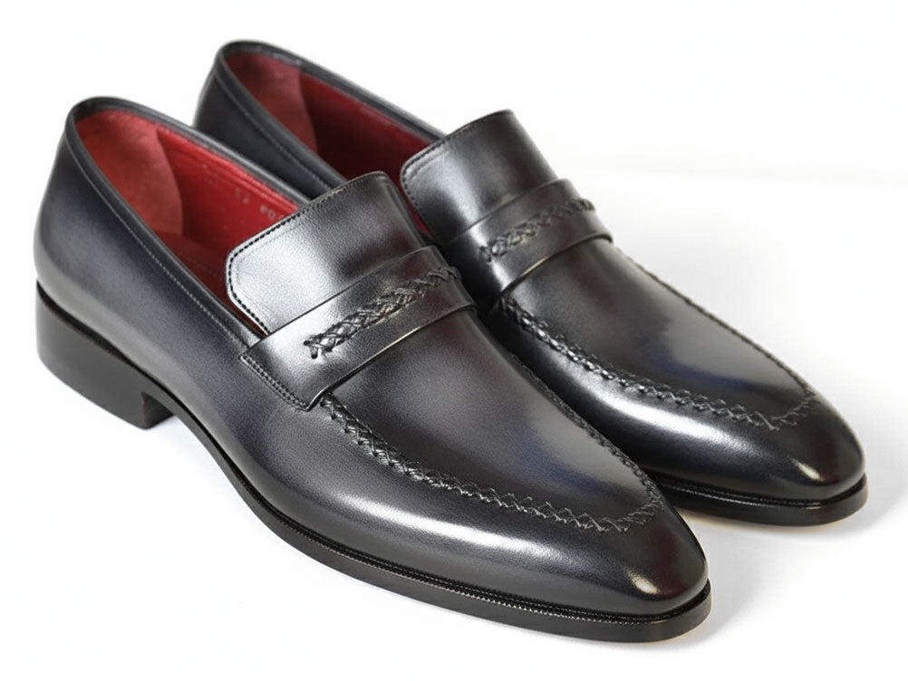 The Paul Parkman Gray & Black Loafers (068-GRAY) feature men's calfskin leather in black with stitched details and a braided accent across the top, displayed on a white background.