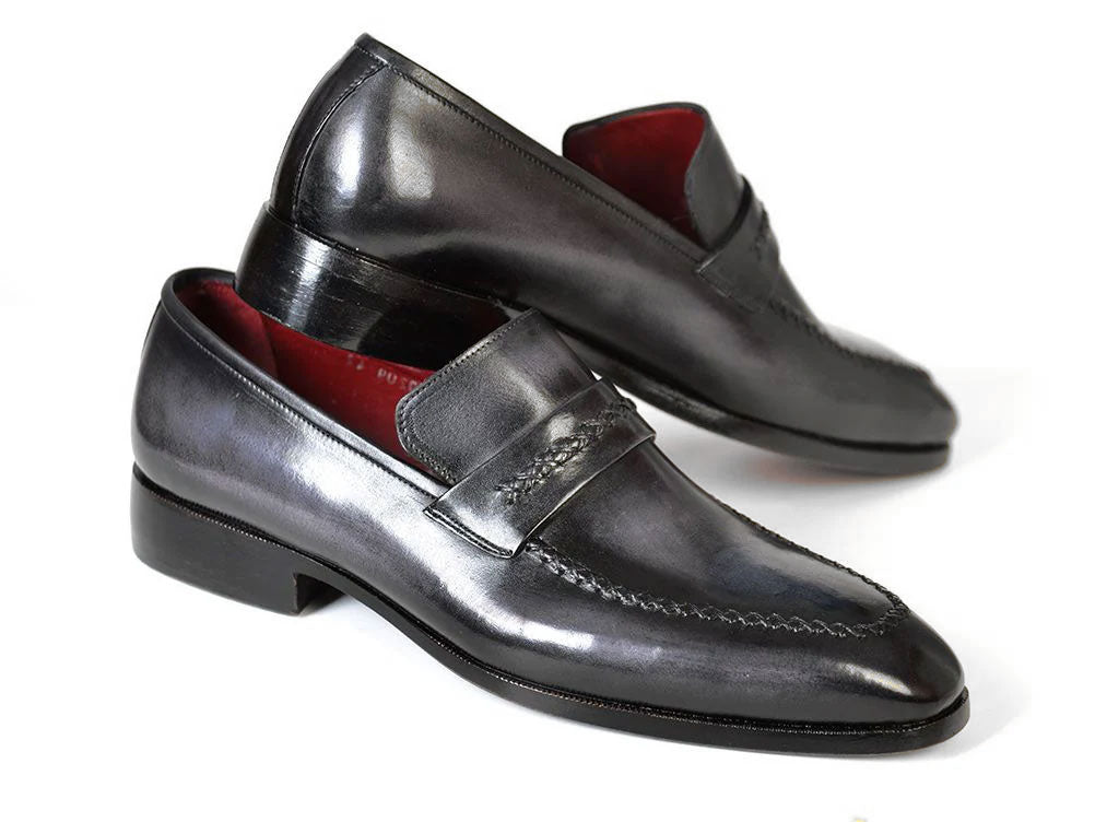 The Paul Parkman Gray & Black Loafers (068-GRAY) feature men's calfskin leather in black with stitched details and a braided accent across the top, displayed on a white background.