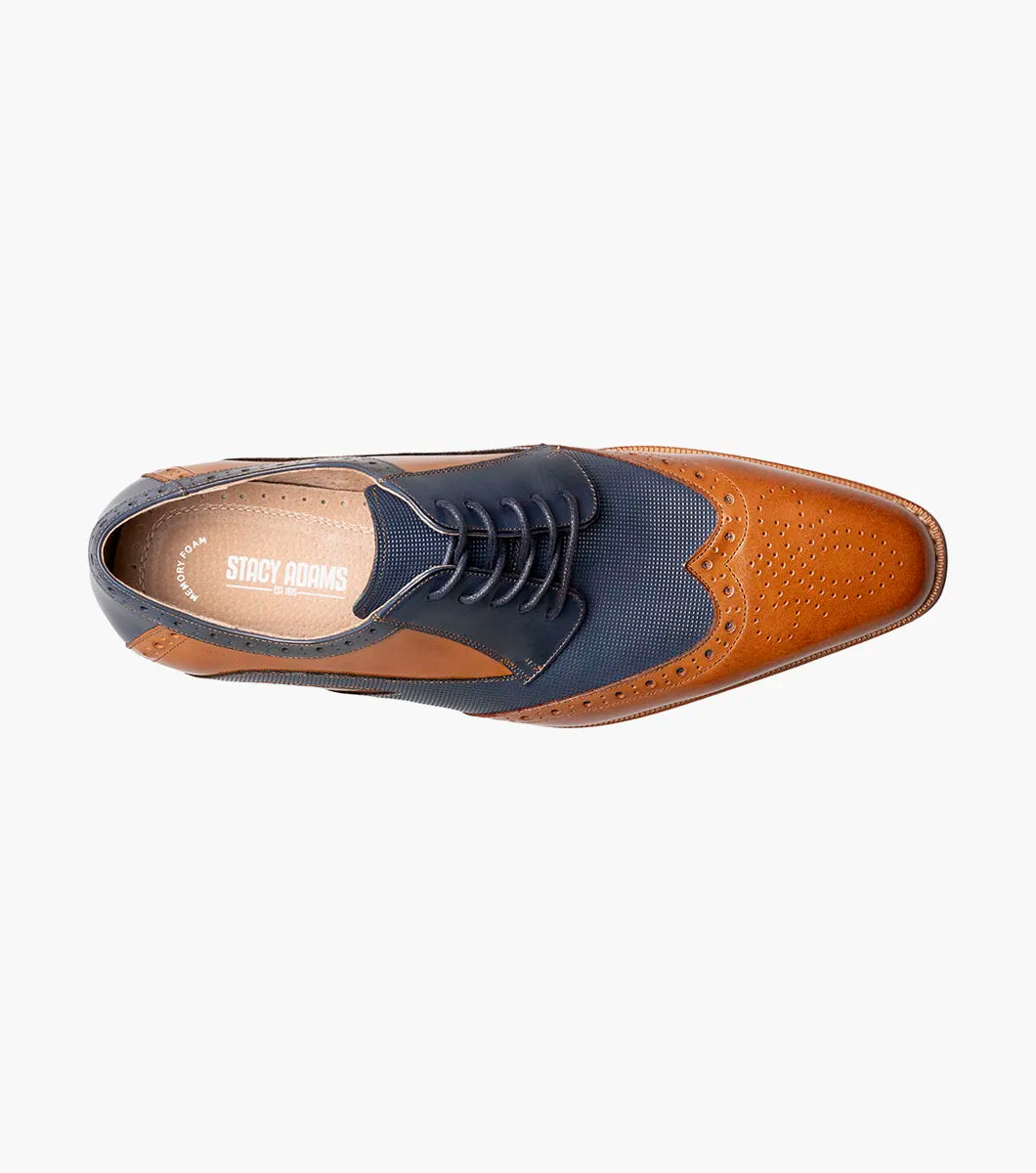 The Stacy Adams Ivingale Wingtip Oxford (Tan Multi) features brown leather and navy panels, brogue details, laces, a memory foam footbed, and a brown sole. Model: 25684-238.