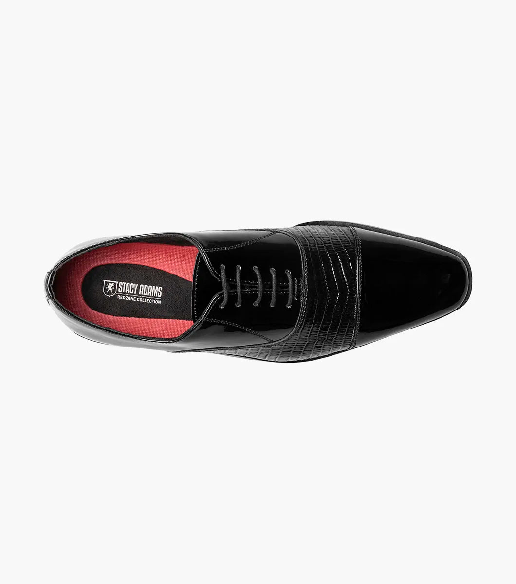 The Stacy Adams Razzeto Cap Toe Oxford in black features a patent leather lizard print, textured midsection, lace-up closure, and RedZone footbed for comfort, shown against a white background.