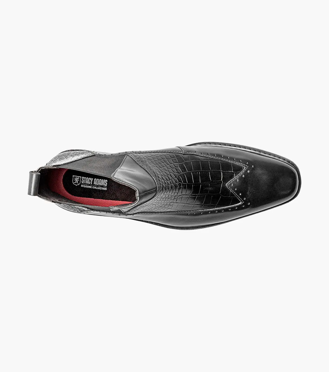 The Stacy Adams Garza Wingtip Chelsea Boot (Black, 25782-001) features crocodile texture accents, elastic side panels, a heel pull tab, and a low heel on a flat sole.