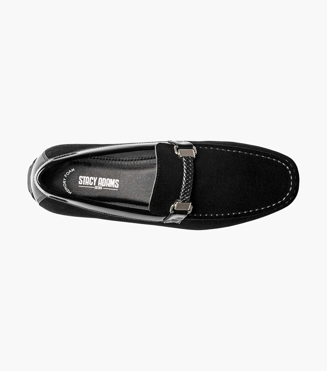 The Stacy Adams Sheridan Moc Toe Bit Slip On (black, 25761-001) is a sleek black suede dress shoe with braided detail and metal accent, low heel, and satin-lined interior for comfort.