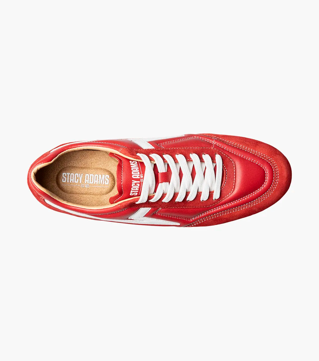 Introducing the STACY ADAMS Action 150 Sporty Lace Up in red (style 25797-600), a modern sneaker highlighted by sporty white laces and a distinctive white zigzag pattern along the side, displayed against a plain white background. The cushioned footbed provides comfort with every step.