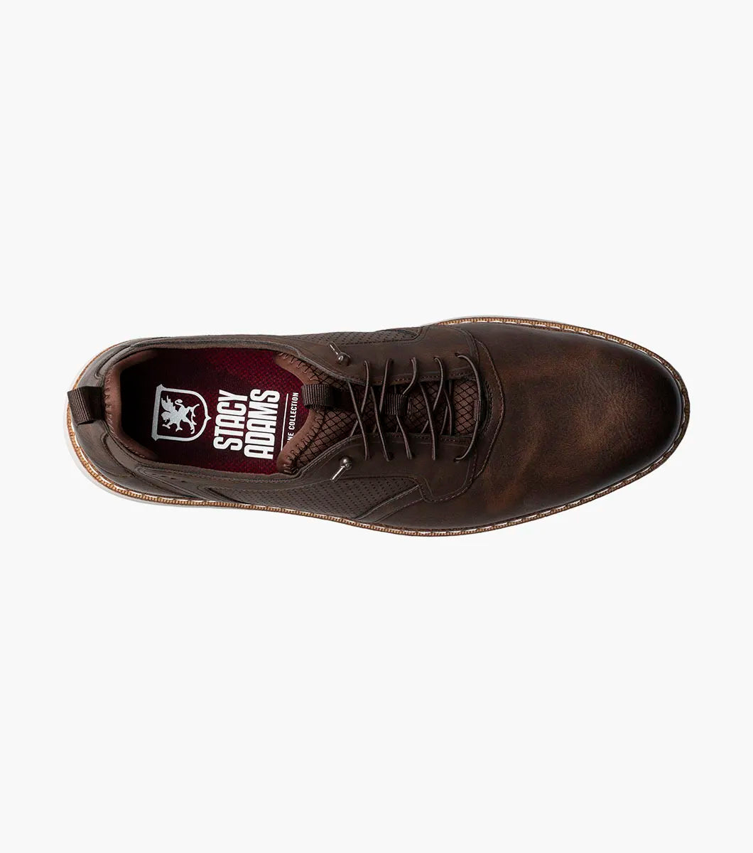 The STACY ADAMS Score Plain Toe Elastic Lace Up in Brown (style 21538-215) is a business-casual leather shoe featuring perforated side panels, a white sole, elastic lace-up front, and detailed stitching with a supportive RedZone footbed—displayed against a plain white background.