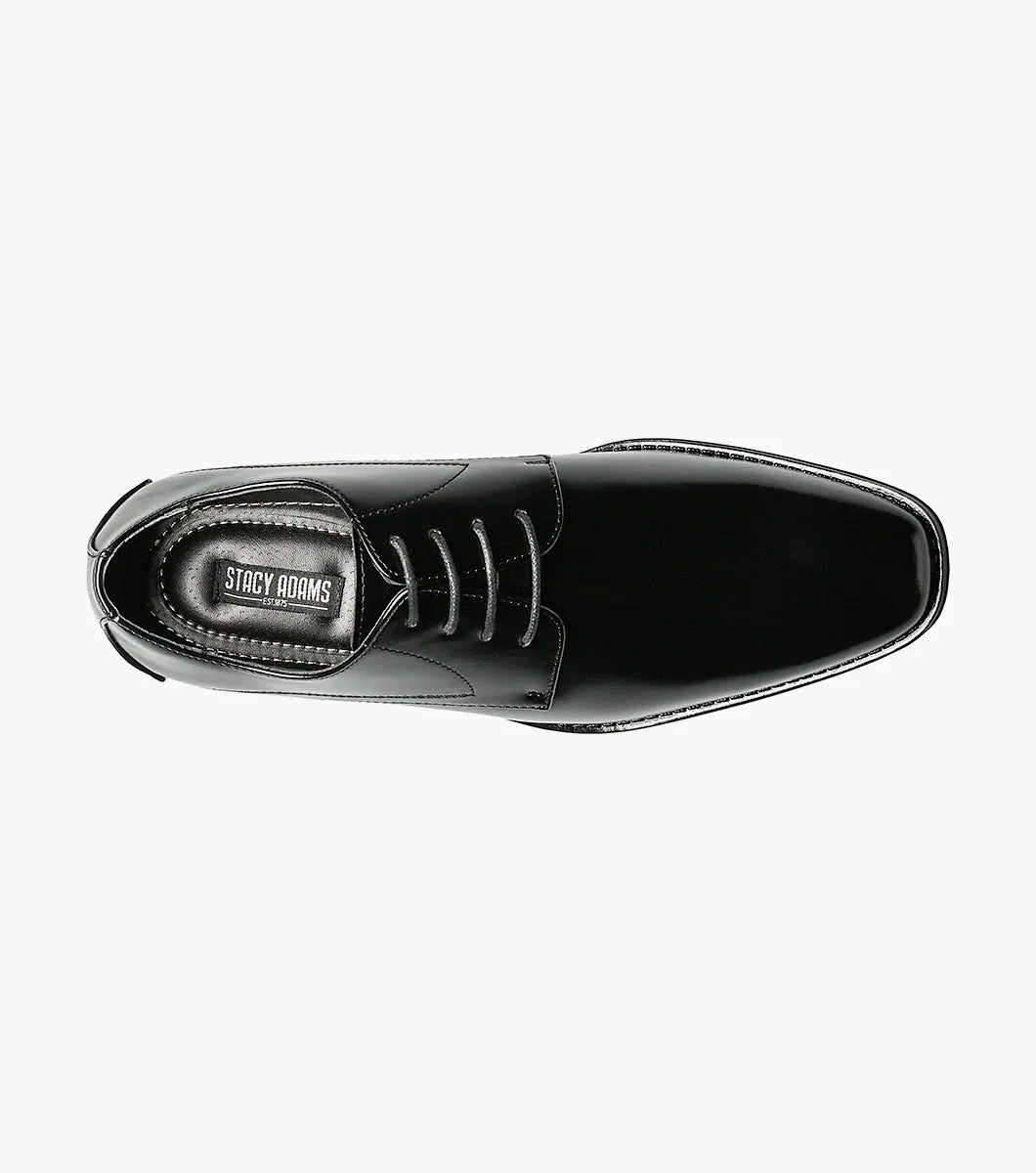 The STACY ADAMS Wayde Plain Toe Oxford (Black, 20144-001) is a leather lace-up dress shoe with a low heel, cushioned footbed, and polished finish, shown here on a plain white background.
