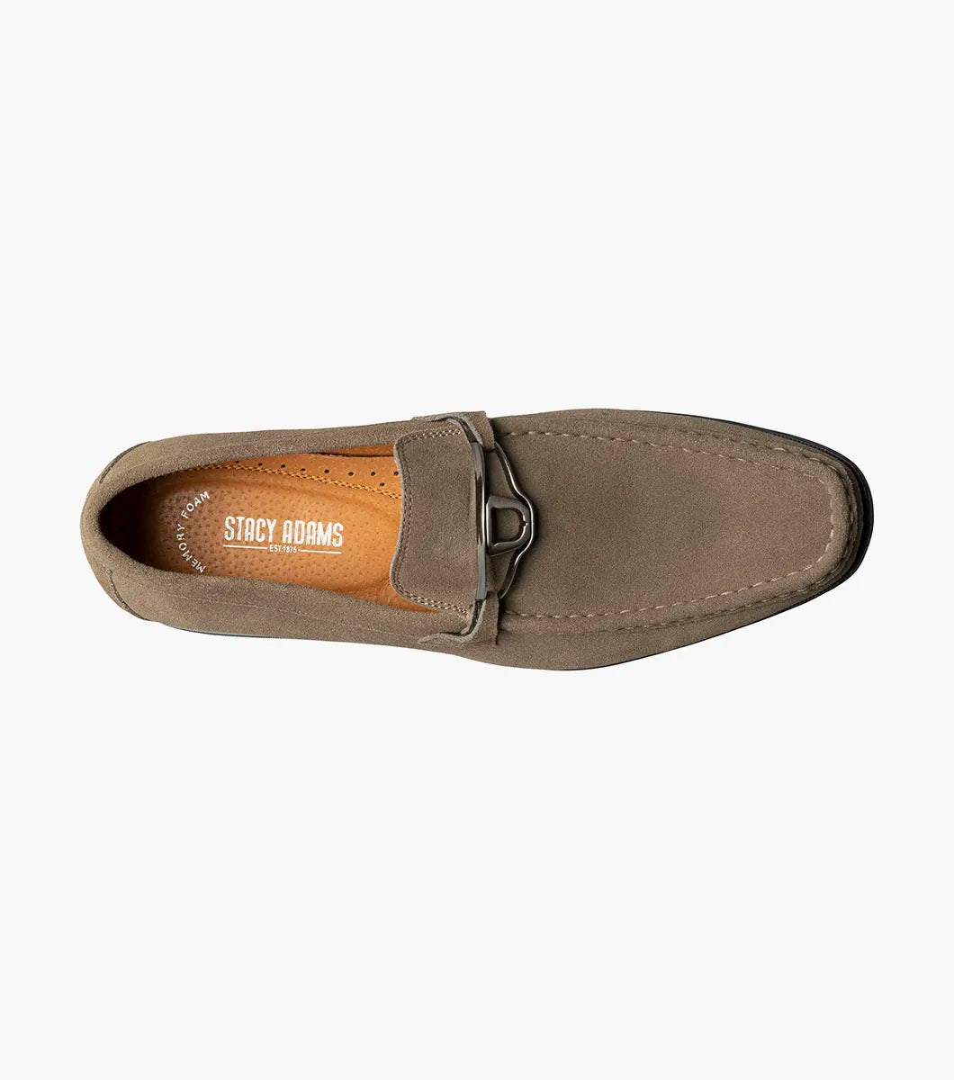 The Stacy Adams Palladian Moc Toe Slip On in Fossil Suede features a metal bit, visible stitching, and a black rubber sole for hybrid dress-casual comfort. Shown here is the men's shoe by STACY ADAMS on a white background.