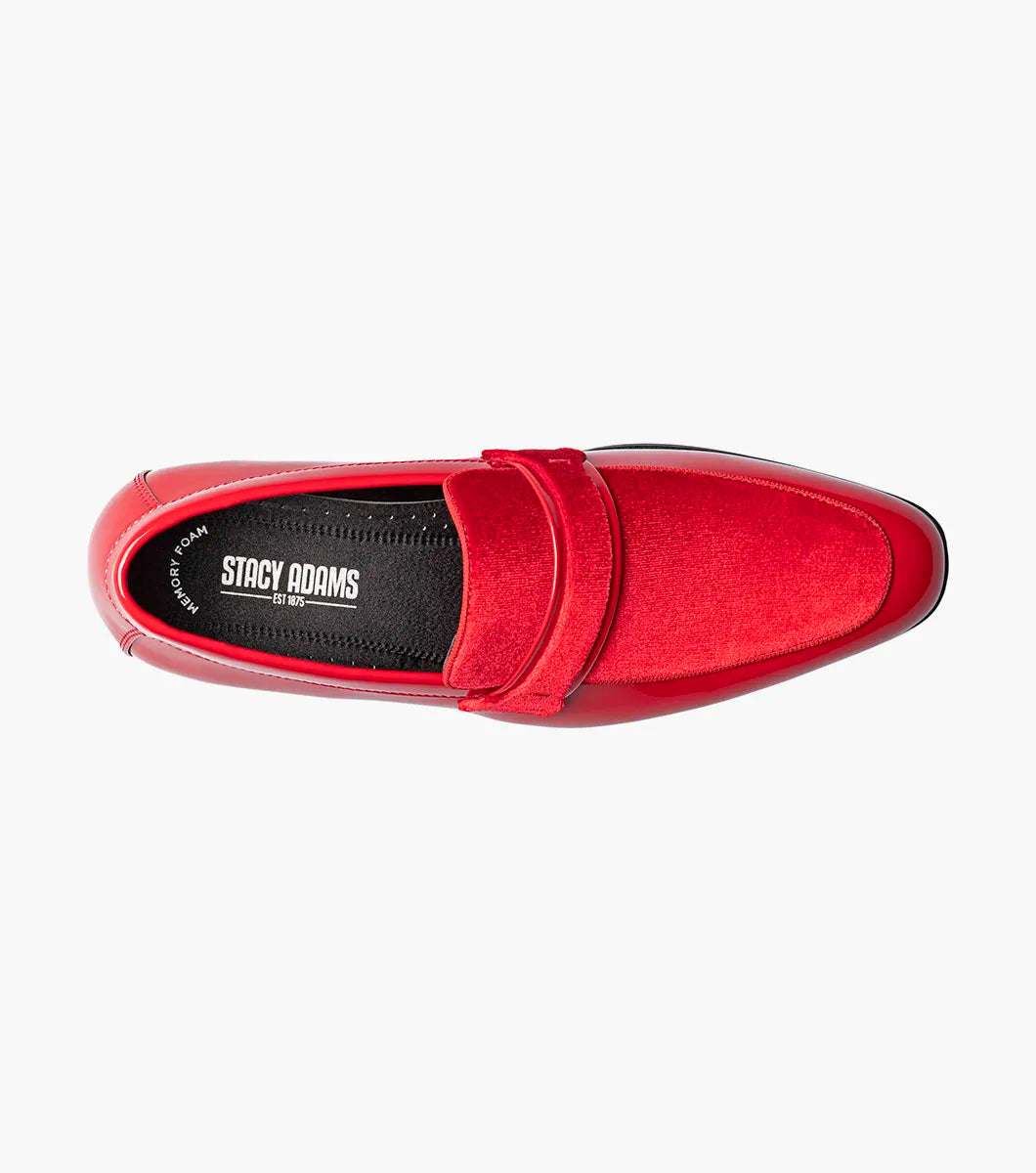 The Stacy Adams Spratley Moc Toe Saddle Slip On in red features a velour upper, matte strap, and black sole. This single shiny loafer (25686-600) by STACY ADAMS is displayed on a white background.