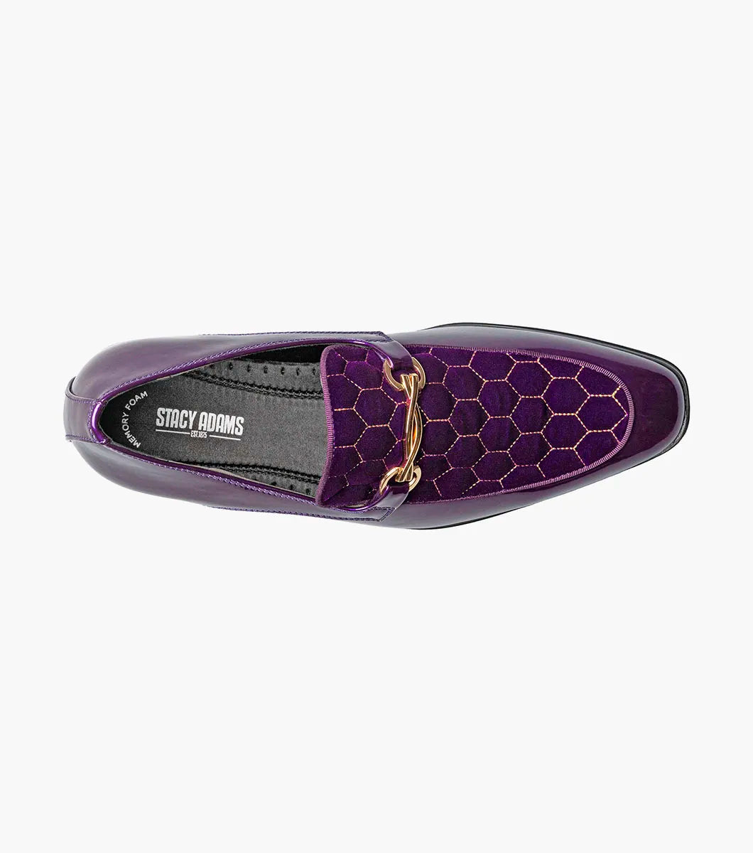 The STACY ADAMS Sprague Moc Toe Bit Slip On (25732-542) is a glossy purple loafer with a hexagonal quilted velvet upper, gold metal bit detail, and memory foam insole for comfort.