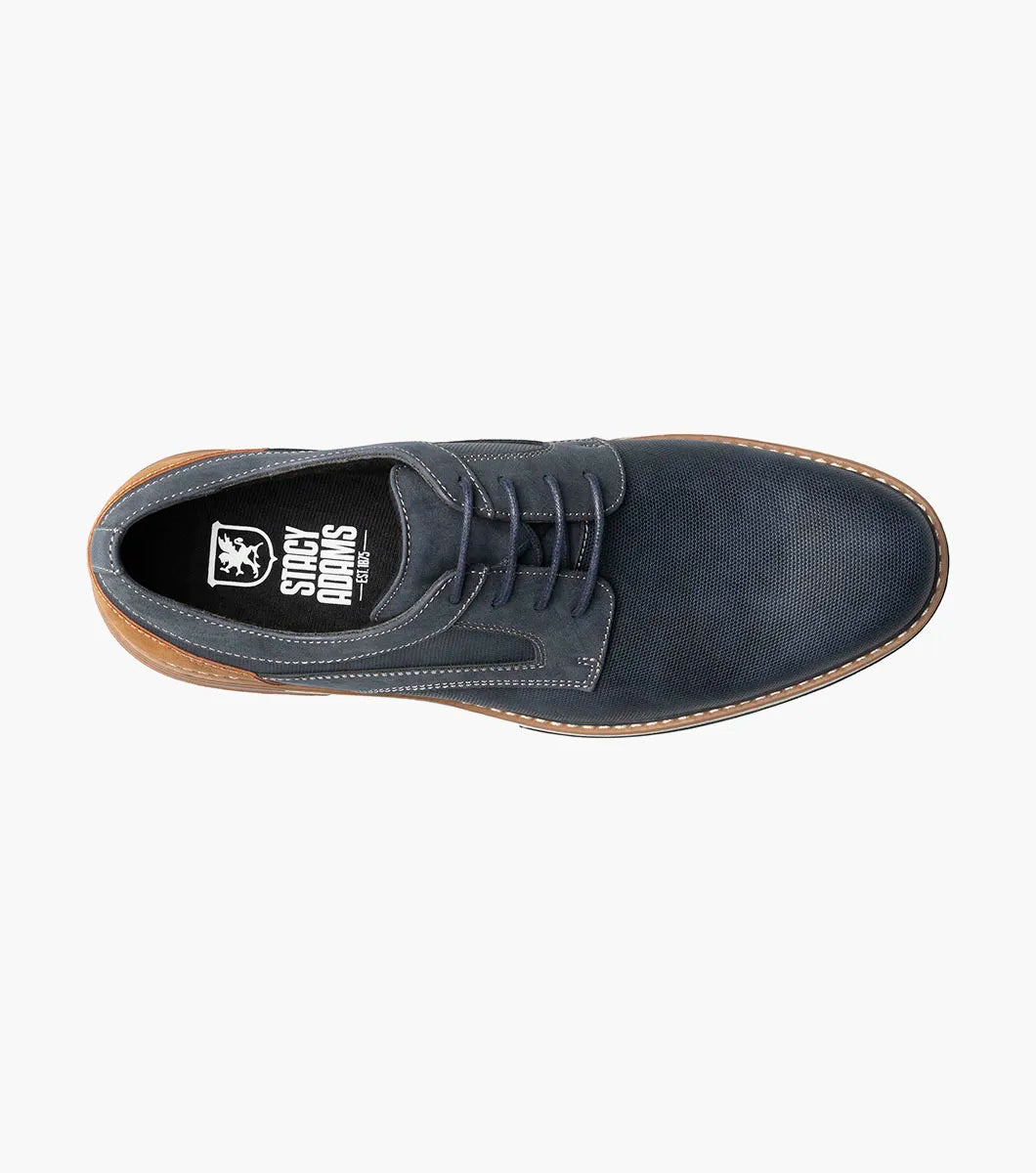 The Stacy Adams Phineas Plain Toe Oxford in navy features tan heel and sole accents, a textured upper, lace-up closure, and cushioned insole for comfort.