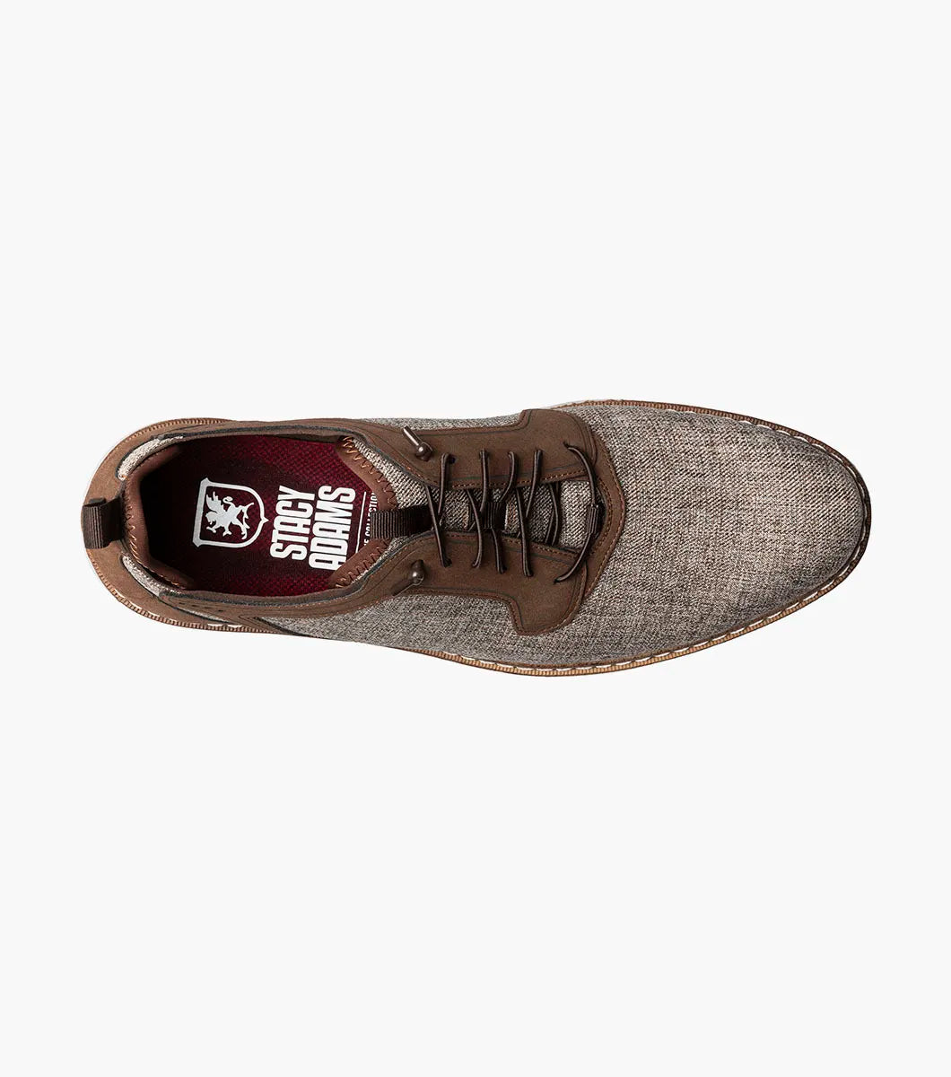The STACY ADAMS Scanlan Plain Toe Elastic Lace Up in Brown Multi (25716-249) features a textured fabric upper, leather accents, Memory Foam footbed, and white rubber sole, shown in profile against a plain white background.