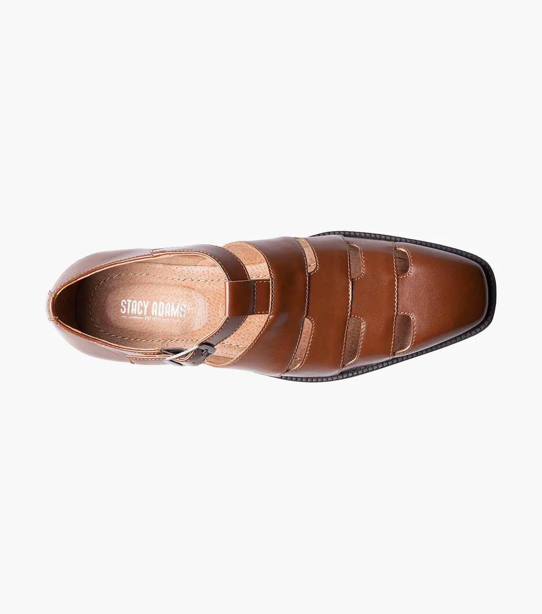 The Stacy Adams Calderon Closed Toe City Sandal in Cognac features a cutout design, buckle strap, low black heel, and cushioned leather footbed for men, displayed on a white background.