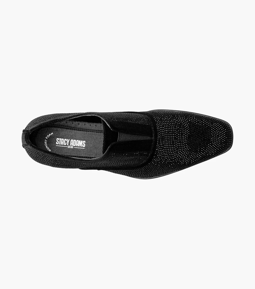 The Stacy Adams Starleigh Rhinestone Plain Toe Slip On (Black, 25685-001) is a men's black slip-on dress shoe with a low heel, rounded toe, cushioned footbed, and small silver rhinestones across the upper.