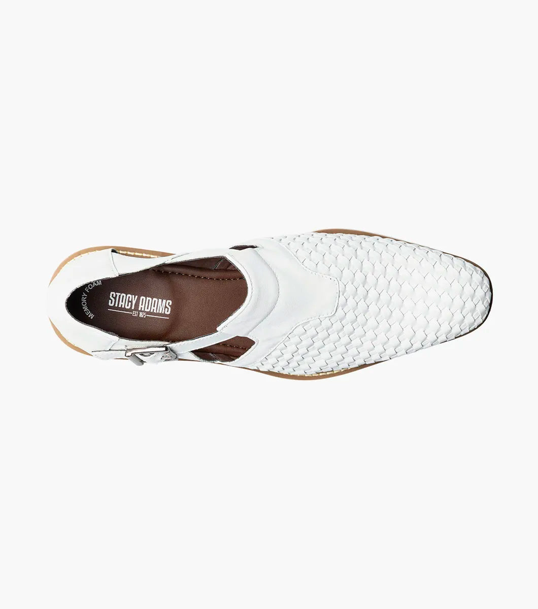 The Stacy Adams Alvarado Woven City Sandal in white features a woven leather upper, buckle strap, brown sole, white serrated outsole, and a soft memory foam insole for comfort. Displayed on a white background.