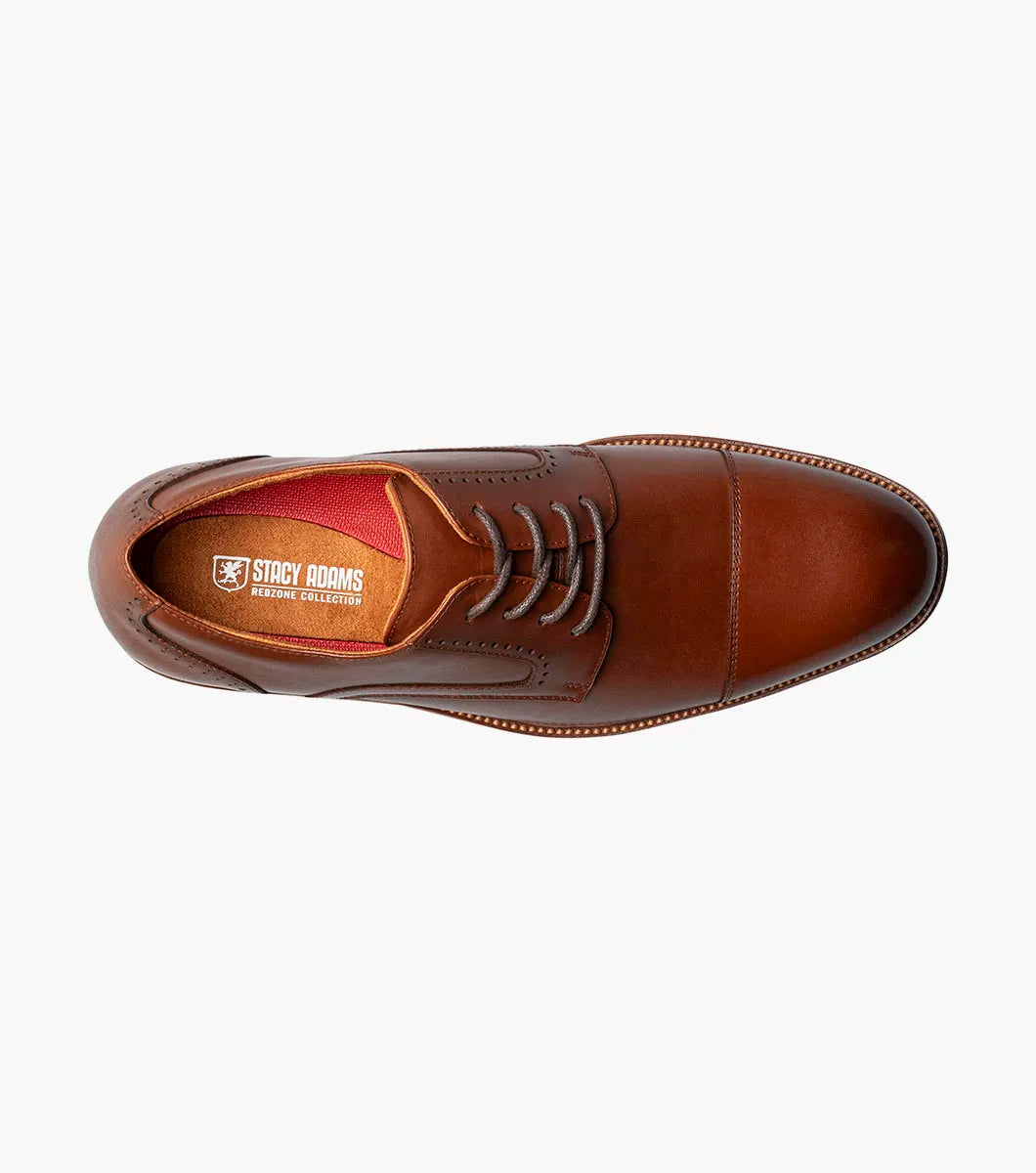 The Stacy Adams Wesbridge Cap Toe Oxford in chocolate features burnished leather, a tan sole, black laces, and anatomical arch support. Displayed on a white background. Brand: STACY ADAMS.