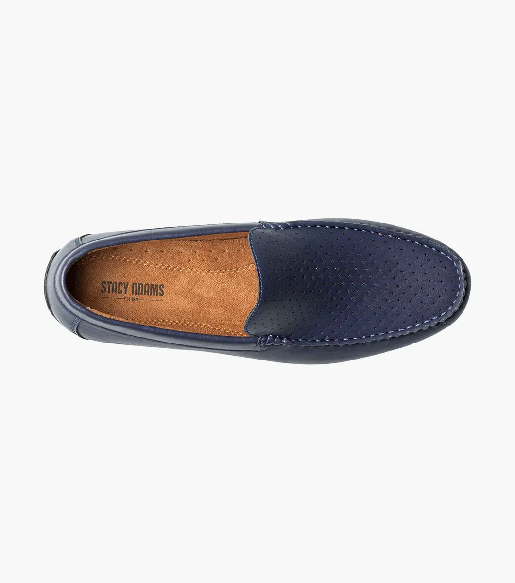 The STACY ADAMS Conroy Moc Toe Perf Slip On (Navy, 25702-410) features a perforated leather upper, cushioned footbed, and black sole, shown in side profile against a plain white background.