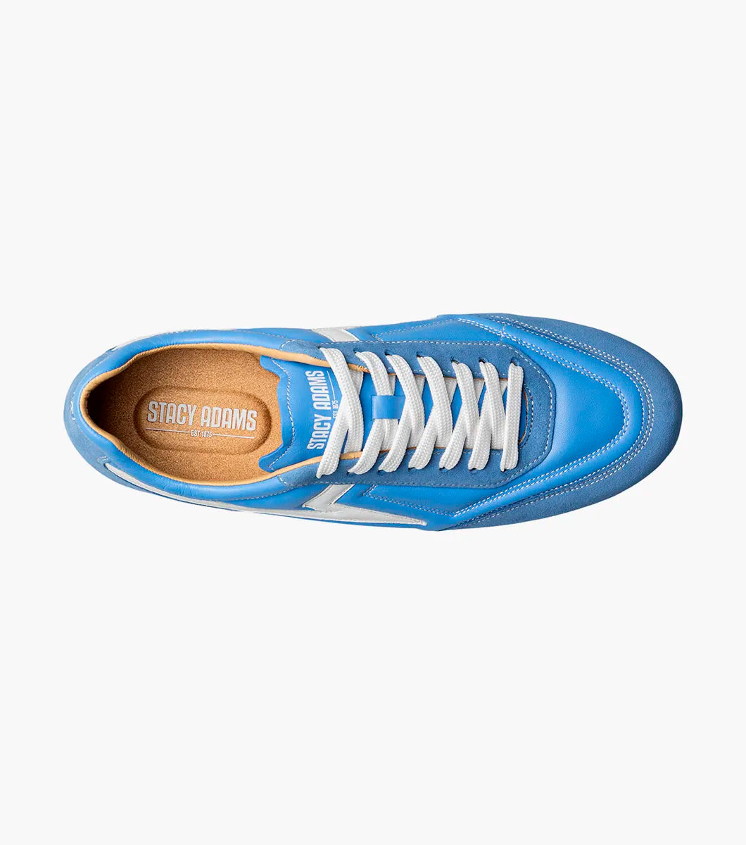 The STACY ADAMS Action 150 Sporty Lace Up in blue (style 25797-400) features white accents, white laces, and a suede toe. This low-top sneaker is showcased against a plain white background.