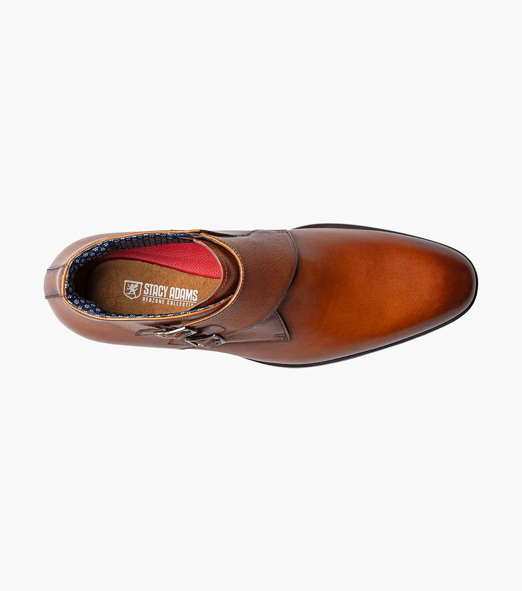 The STACY ADAMS Kaius Plain Toe Double Monk Strap Boot in Cognac (25733-221) features hand-burnished leather, a textured side panel, low stacked heel, and anatomical arch support, shown on a white background.